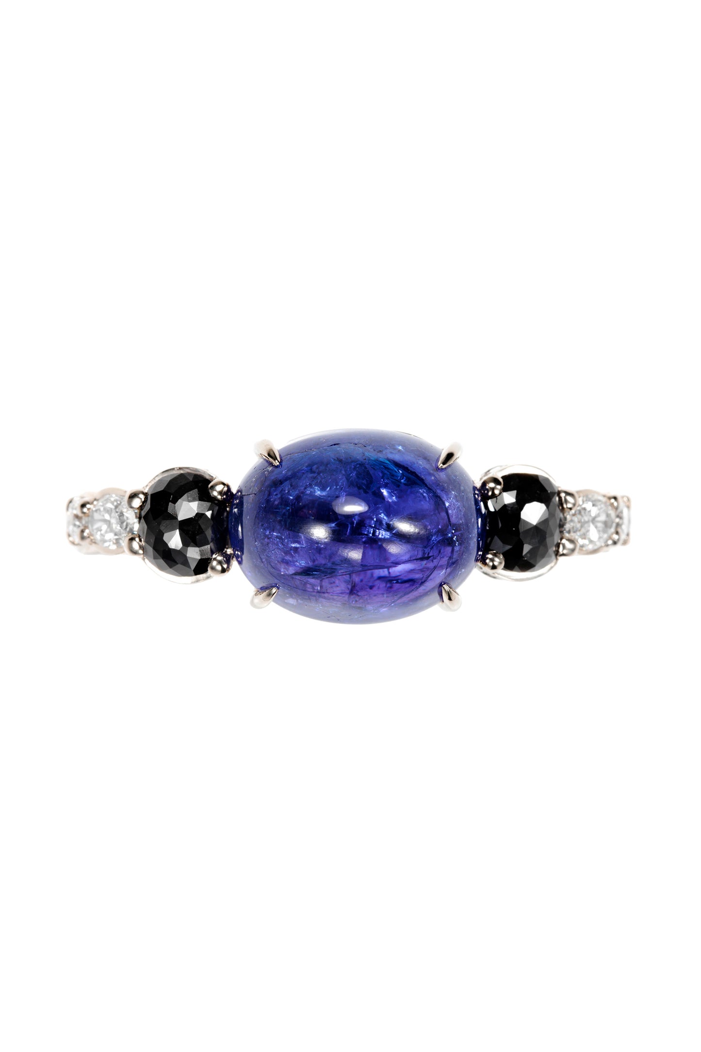 Tanzanite two-finger ring with black and white diamonds in 18k white gold