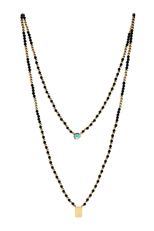 Paraiba tourmaline Talisma scapular with onyx in 18k yellow gold