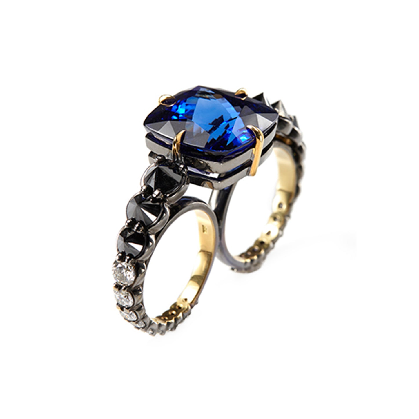 Tanzanite two-finger ring with inverted black diamonds and white diamonds in 18k yellow gold