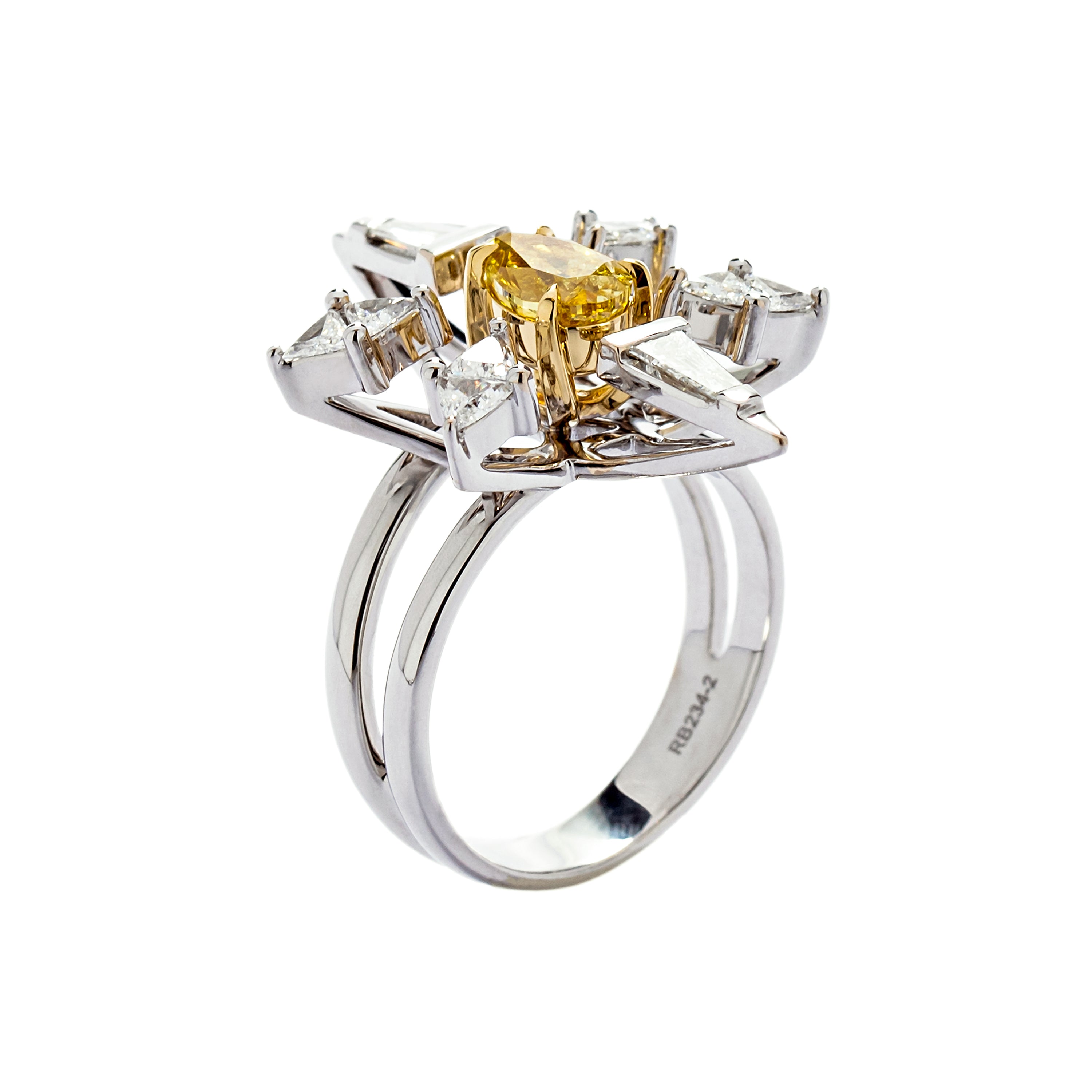 Fancy vivid yellow diamond Pulsar ring with white diamonds in 18k white and  yellow gold