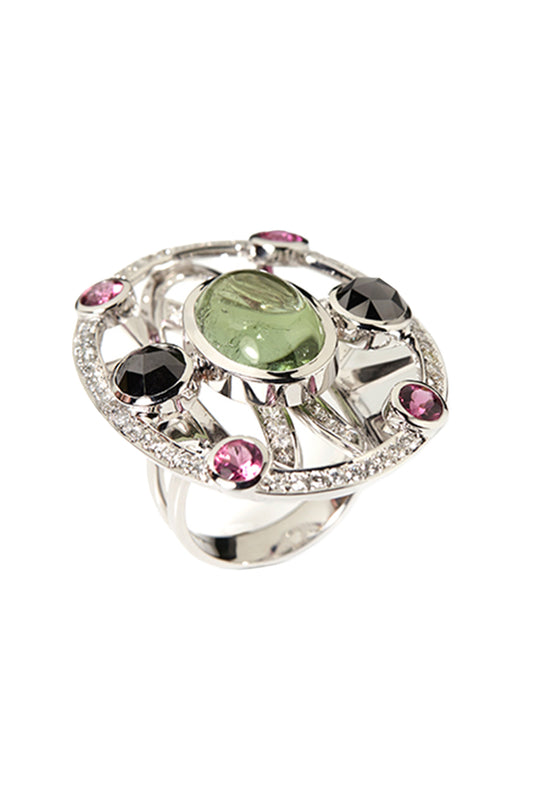 Green tourmaline ring with rubellites, black and white diamonds in 18k white gold