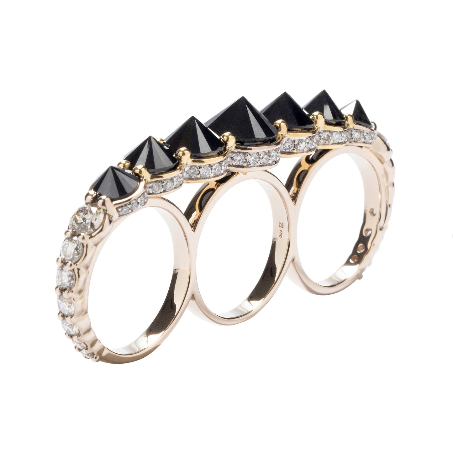 Inverted black diamond three-finger ring with white diamonds in 18k white and yellow gold